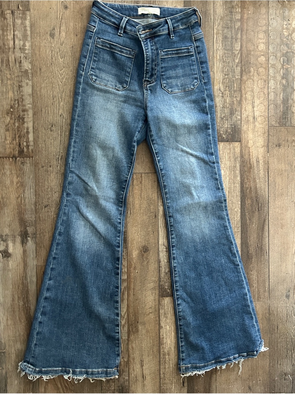 High-Rise Blue Flare Jeans with Patch Pockets
